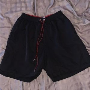 Black swim shorts/ board shorts